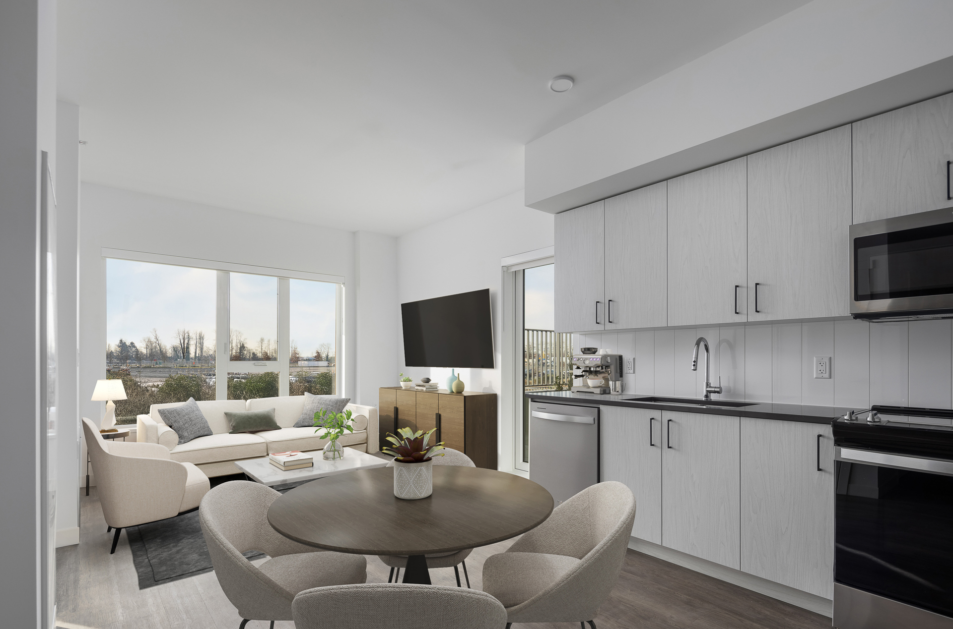 Interior kitchen and living space of a newly built apartment building.