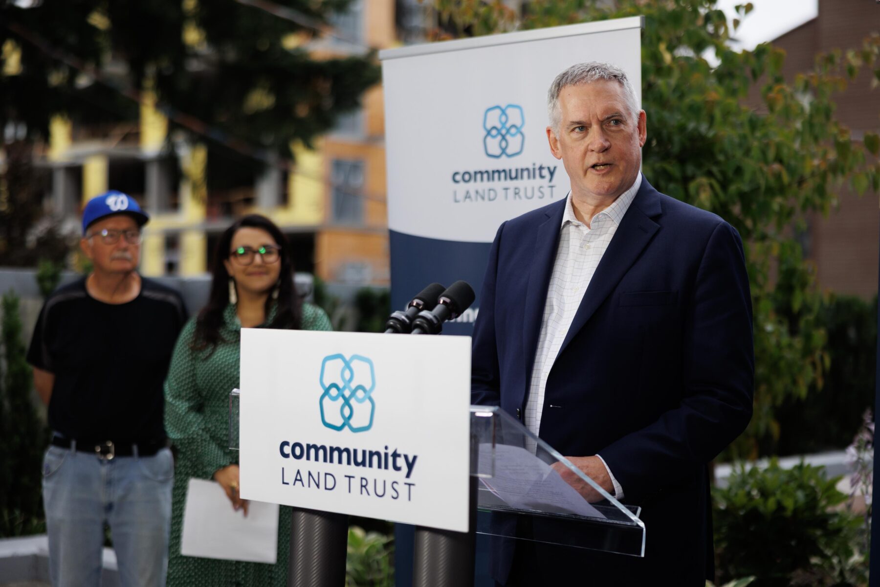 Thom Armstrong speaking at a media event